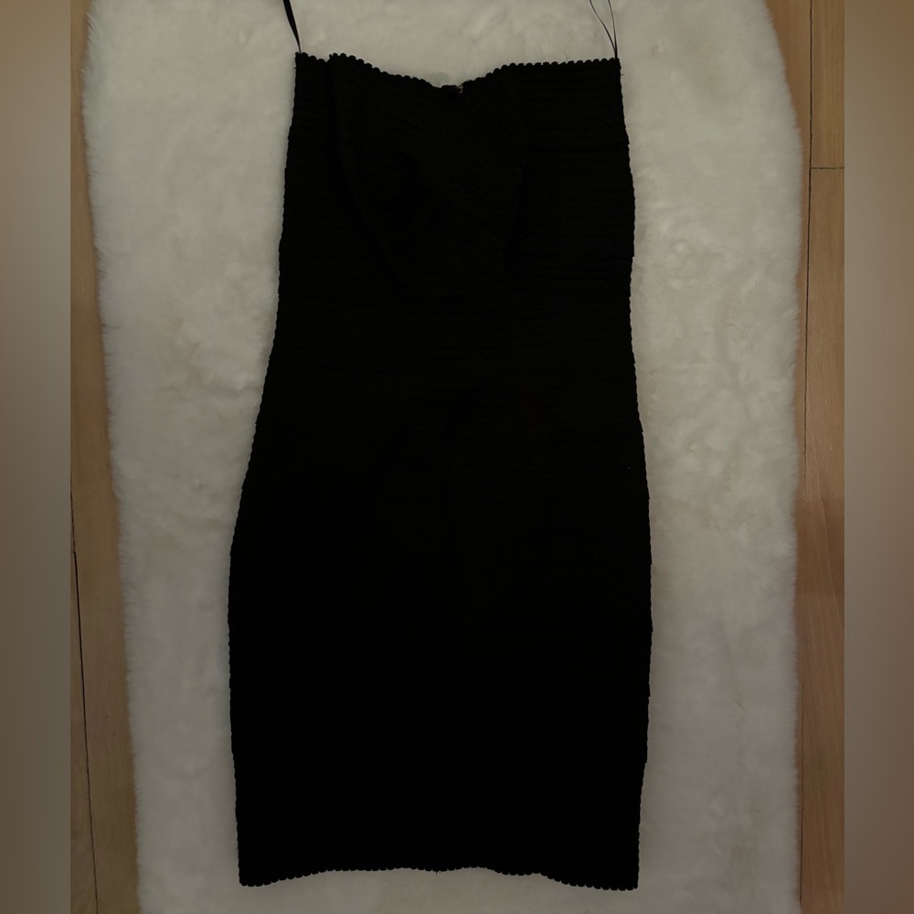 Black Mini strapless bodycon dress.
